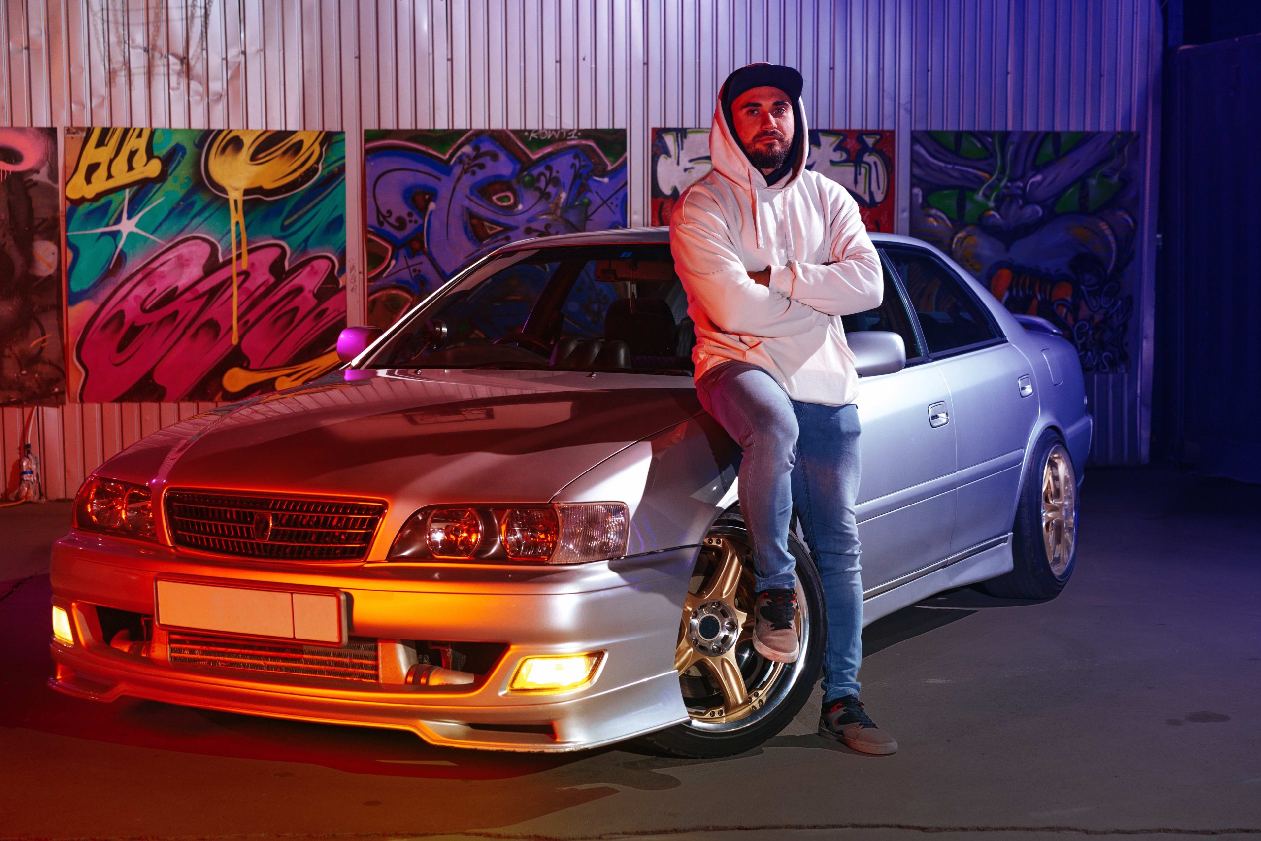 car culture in Australia. car photography - man posing beside his car